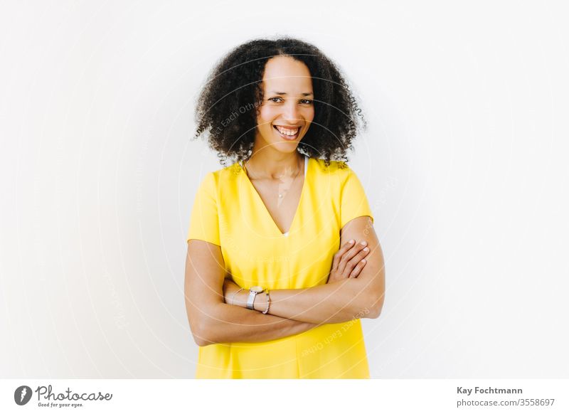 Portrait of smiling woman with crossed arms 25-30 more adult African-American Attractive already Beauty & Beauty Black Self-confidence Curly Day emotion Ethnic