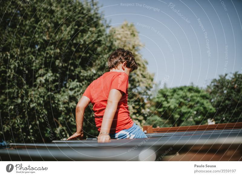 Kid having fun in playground Playing Playground Park Lifestyle Exterior shot Sports Street Playing field kid kids leisure Leisure and hobbies outdoors Summer