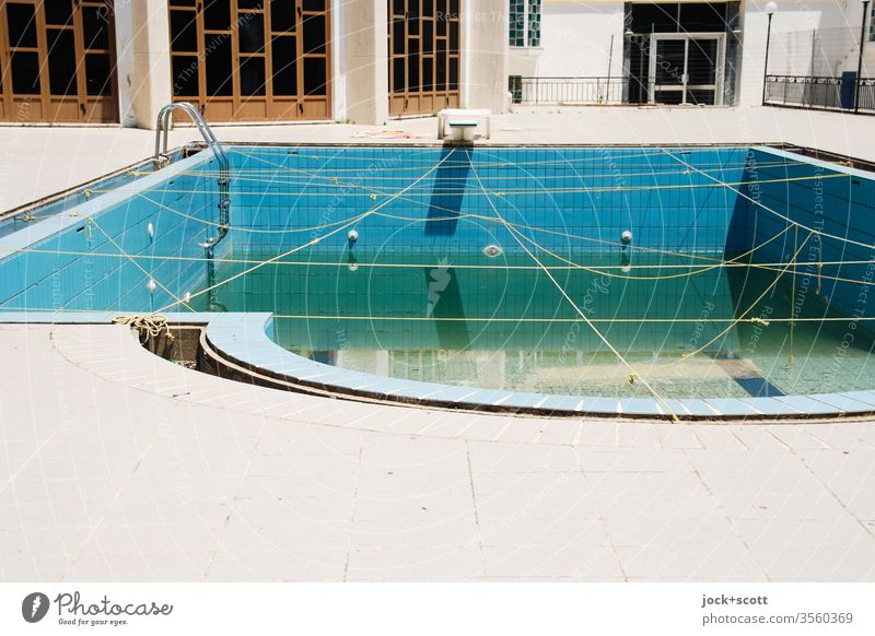 Hotel and swimming pool out of order Corfu Greece Summer Vacation & Travel swimming pools Tourist resort water residue Cords Architecture Derelict Tile