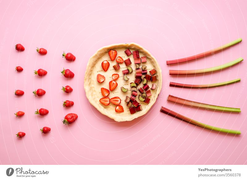 Baking a pie with strawberry and rhubarb, top view. above view bakery baking baking pie cake crust cuisine dessert dough flat lay food food preparing fresh