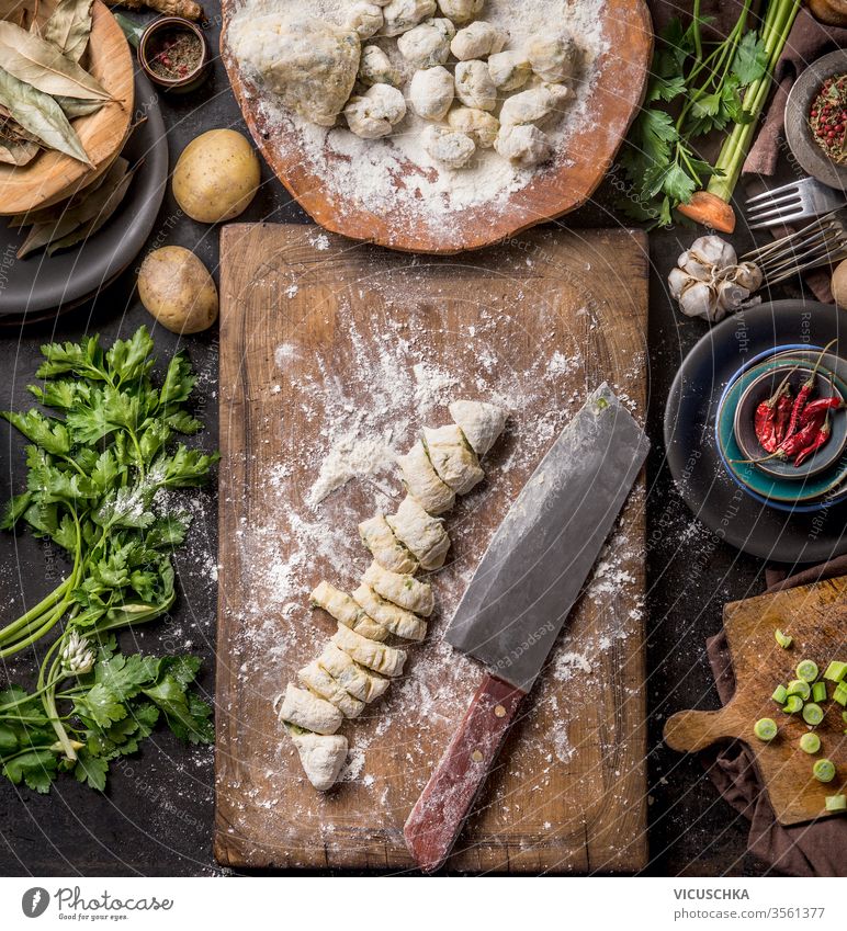 Homemade gnocchi preparation on rustic kitchen table with ingredients. Top view. Potatoes dough . Italian food concept. homemade top view potatoes wooden