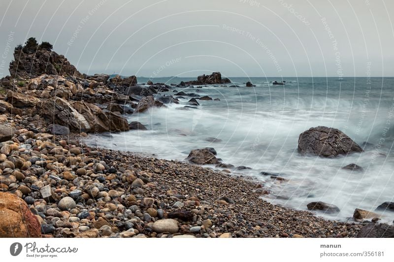 holiday weather Nature Landscape Sky Bad weather Rock Coast Beach Bay Ocean Gravel beach Wanderlust Colour photo Subdued colour Exterior shot Copy Space top Day