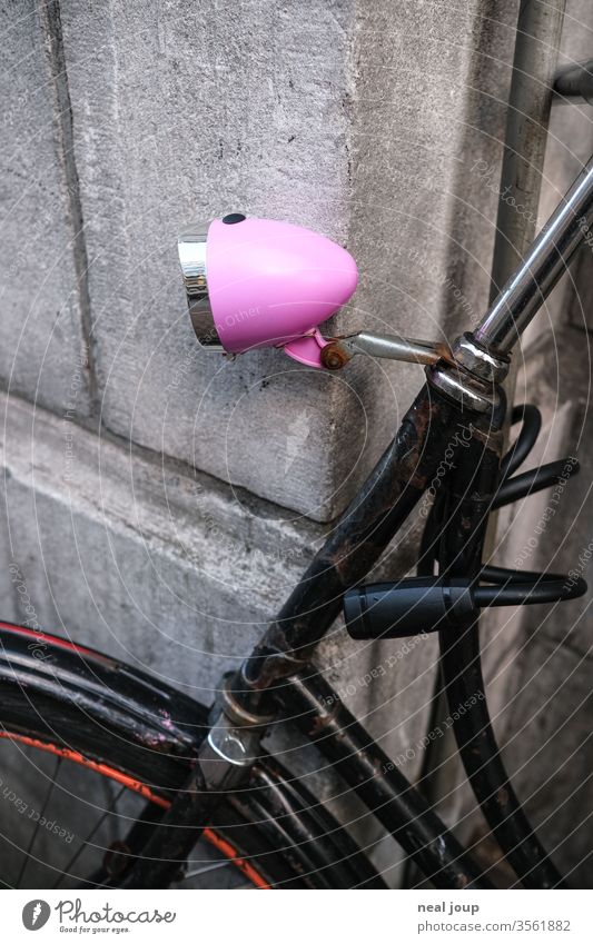 Black Holland wheel, detail pink lamp Bicycle vintage hollandrad Pink Contrast conspicuous Lamp Parking Wait dutch Amsterdam Corner narrative Old