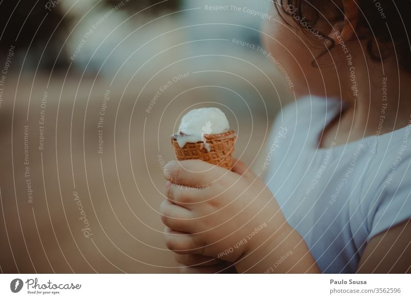 Child holding ice cream Ice cream gelato Summer Ice-cream cone Colour photo Ice cream ball Dessert Eating Food Waffle Candy Sweet Nutrition Delicious