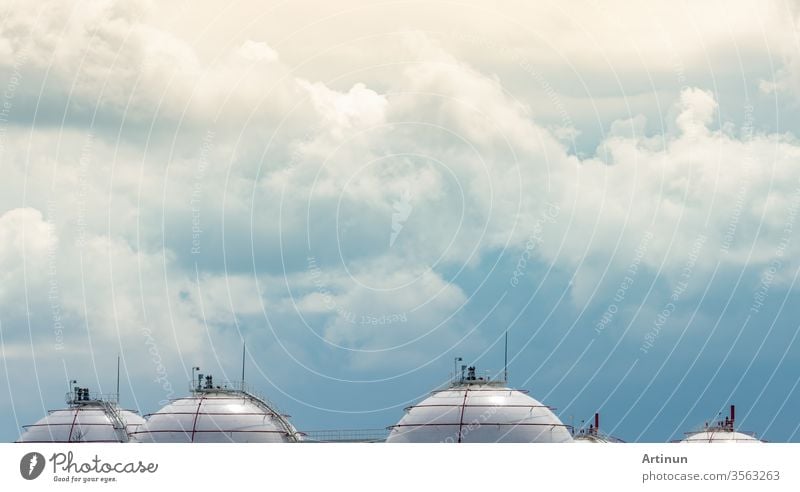 Industrial gas storage tank. LNG or liquefied natural gas storage tank. Spherical gas tank in petroleum refinery. Above-ground storage tank. Natural gas storage industry and global market consumption