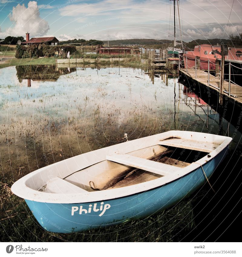 Barque boat Rowboat Pond out Exterior shot Long shot Footbridge Water Air reflection Sky Clouds Horizon