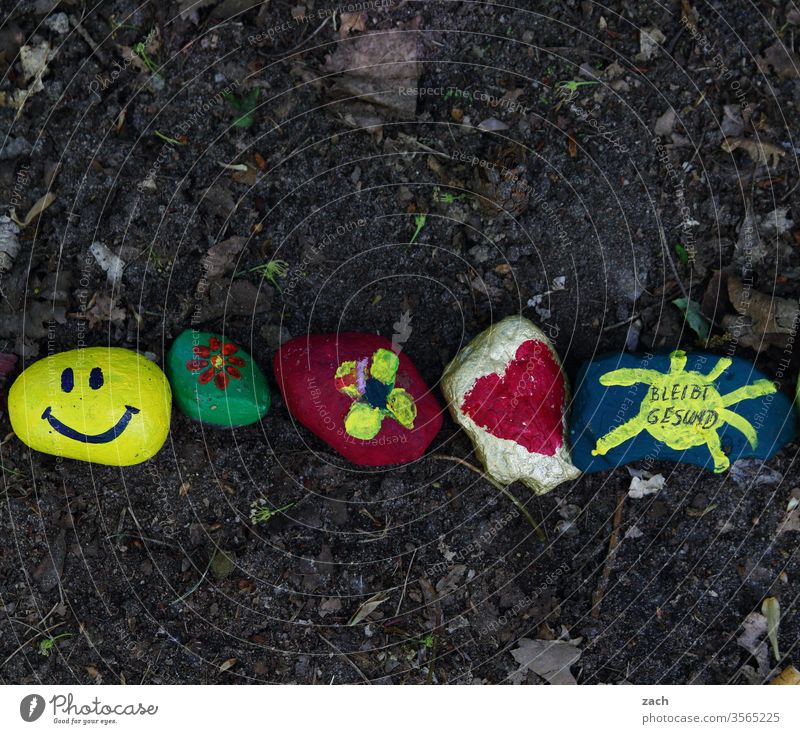 Corona stones painted by children with the inscription remains healthy glimmer of hope Hope Painted Painting (action, artwork) Infancy variegated Together