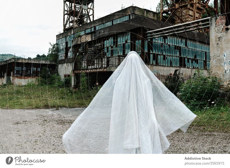 Ghost near abandoned industrial building ghost industry mine old construction grunge desolate destroy metal shabby rust weathered damage aged structure ruin