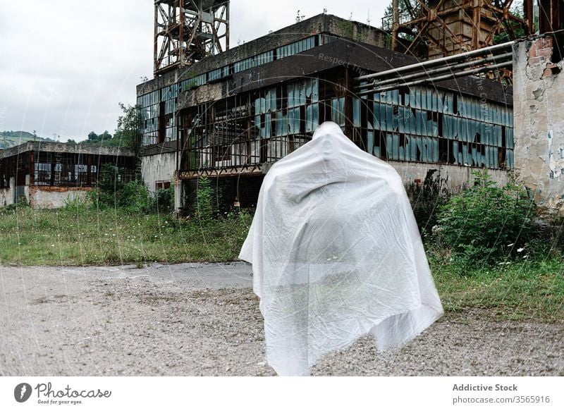 Ghost near abandoned industrial building ghost industry mine old construction grunge desolate destroy metal shabby rust weathered damage aged structure ruin