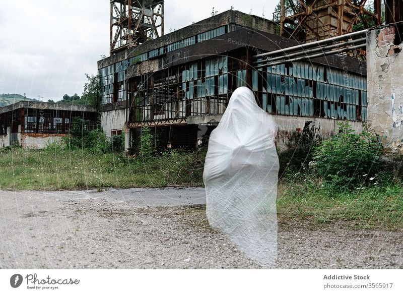 Ghost near abandoned industrial building ghost industry mine old construction grunge desolate destroy metal shabby rust weathered damage aged structure ruin