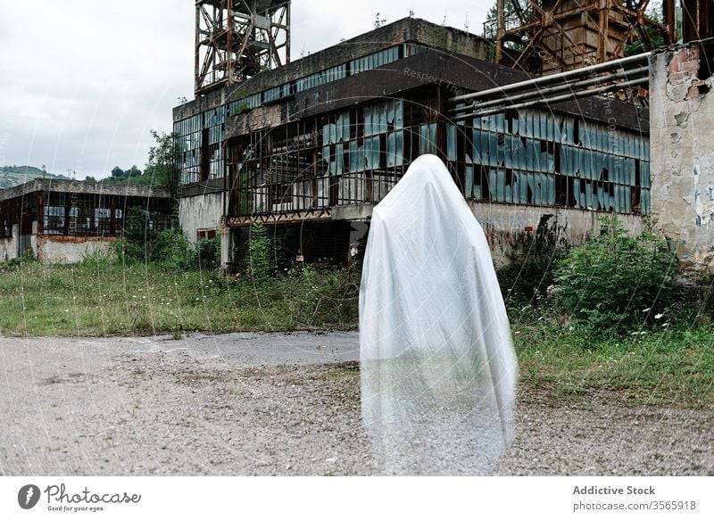 Ghost near abandoned industrial building ghost industry mine old construction grunge desolate destroy metal shabby rust weathered damage aged structure ruin