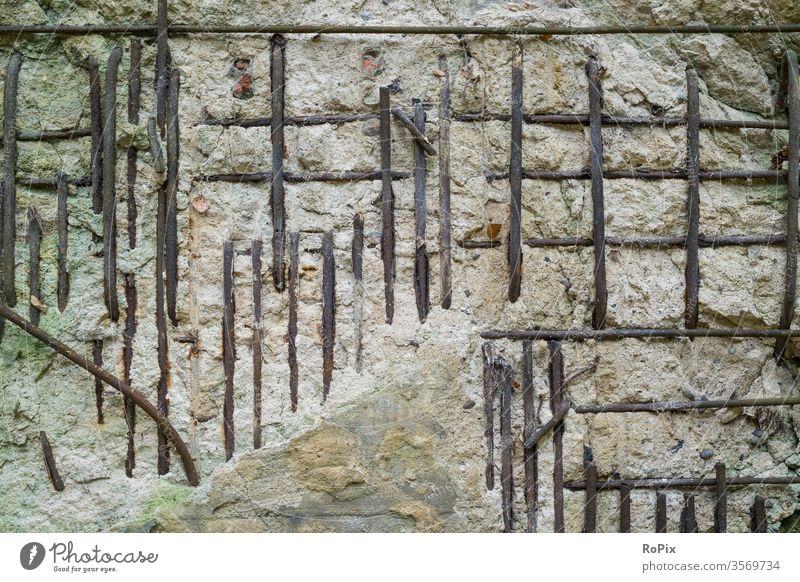 Detail of an old bunker wall. Wall (barrier) Grating Wall (building) rampart Depot Granite Ruin Sandstone Architecture country Country life Nostalgia Town urban