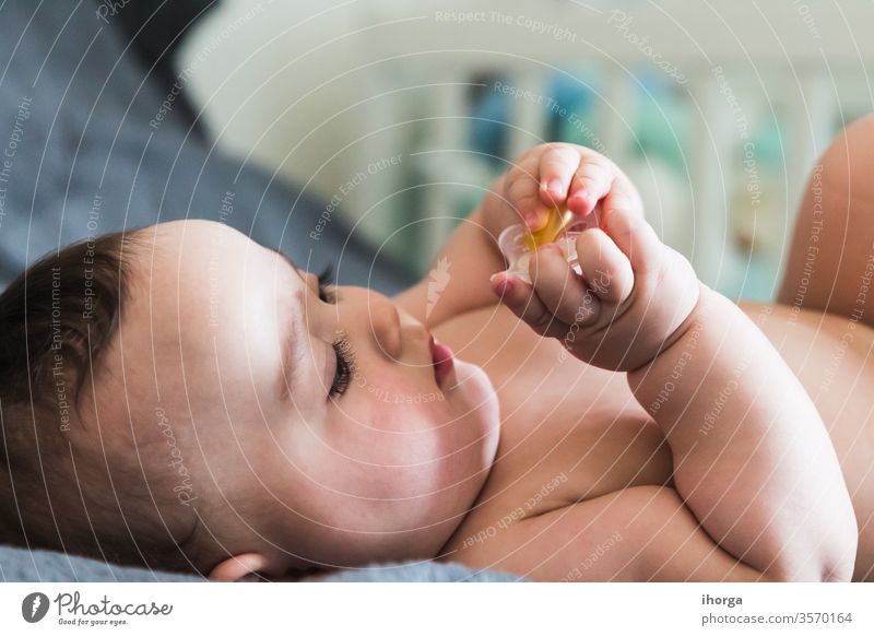 portrait of a beautiful sleeping baby adorable beauty boy caucasian child childhood close-up closed closeup cute dream eyes face hand health healthy human