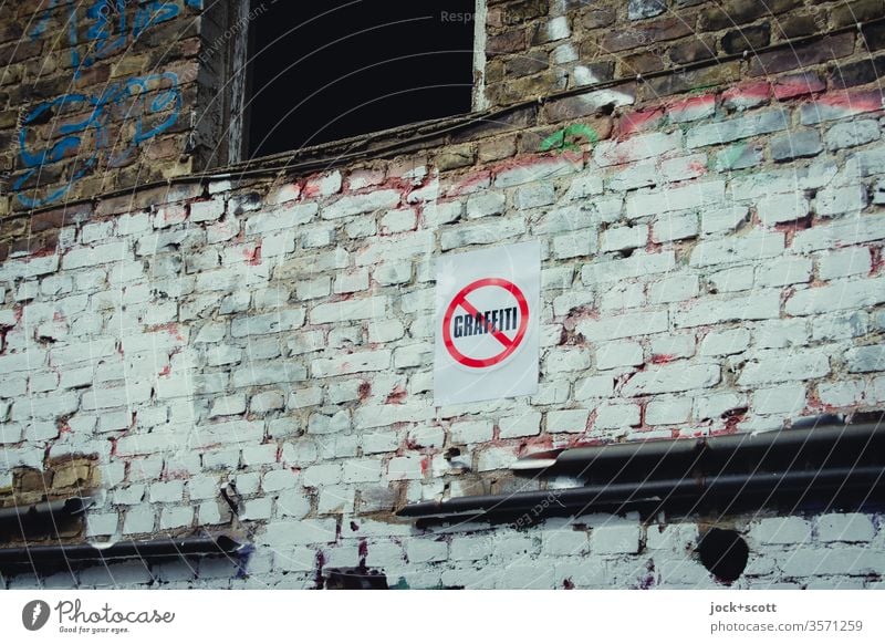 No graffiti! lost places Facade Ravages of time Brick Bans Capital letter Old Derelict Wall (building) Trashy Graffiti paint over Subdued colour open space