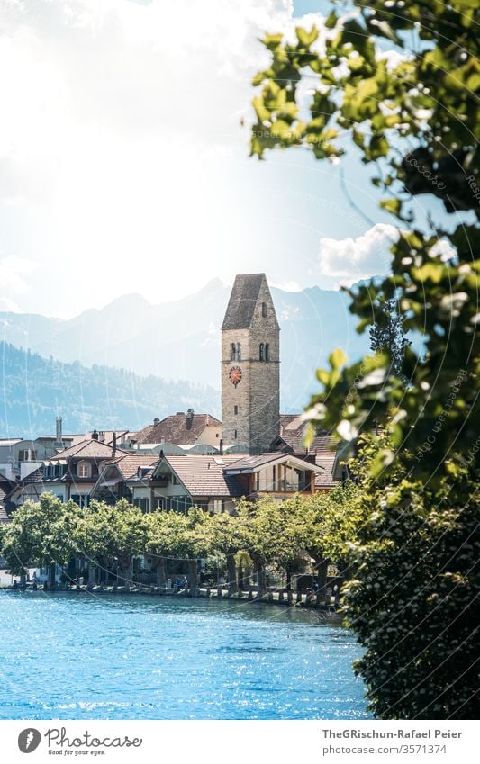 View of church in Interlaken (Switzerland) Tourism Church River tree Exterior shot Colour photo Deserted Day Vacation & Travel Trip Summer Landscape mountains