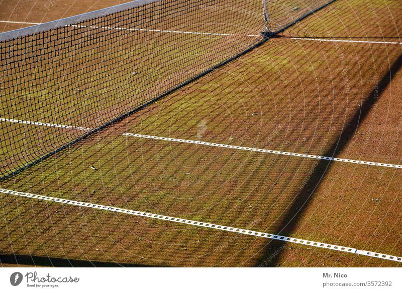 Tennis court Net Tennis tournament Sports Ball sports Leisure and hobbies Line Shadow Sporting Complex Sand place ash lines Places Playing field Sporting event