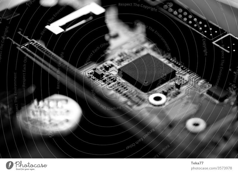 some modern black computer chips on an mainboard modern computer chip modern cpu plain cpu modern central processing unit black motherboard computing