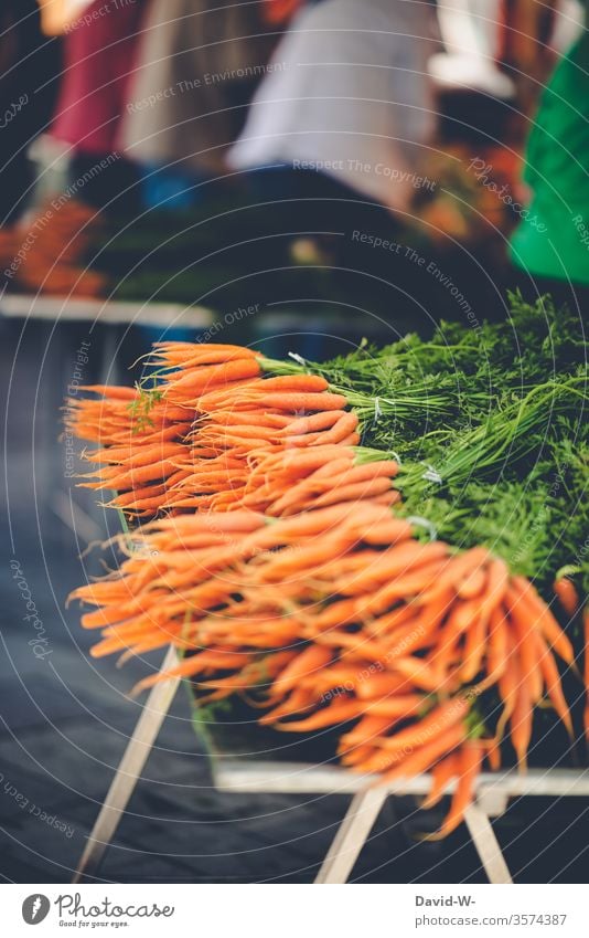 Weekly market - fresh carrots Marketplace Farmer's market Vegetable Market stall Sustainability salubriously Organic produce Merchant consumer buyer Seller