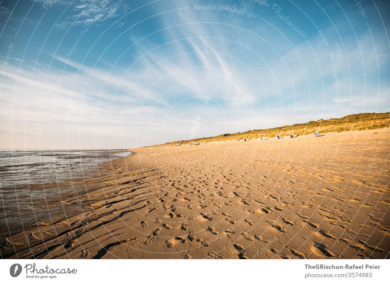 Sandy beach in Sylt Beach vacation Vacation & Travel Beautiful weather North Sea Summer Ocean Water Sky Blue Deserted Sunset Beach dune beach chair Germany