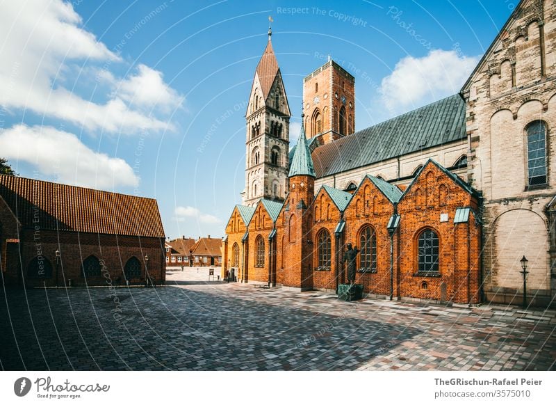 Impressive church - deserted House (Residential Structure) house cell Ribe Denmark Clouds Sky Exterior shot Blue Vacation & Travel Tourism Paving stone Historic