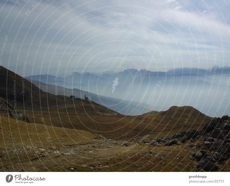 Mountain landscape I Fog Clouds Gravel Meadow Light Federal State of Tyrol Religion and faith Beam of light