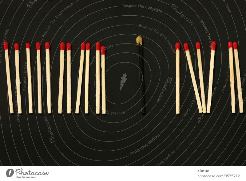 Photochallenge I a row of matches with red heads and a black match with yellow head on a black background Match match head sorted Individualist be different