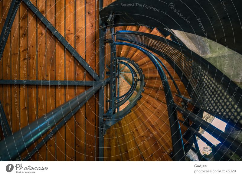 View upwards into a staircase made of wood and metal, spiral staircase Stairs Staircase (Hallway) Architecture Banister Interior shot Deserted Colour photo