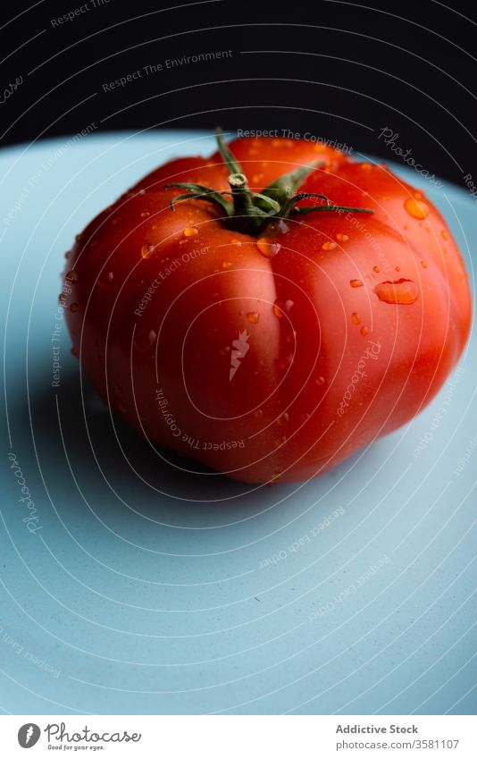 Fresh tomato on plate in kitchen ripe fresh healthy food organic ingredient vegetable delicious waterdrop natural vegetarian nutrition diet tasty vitamin