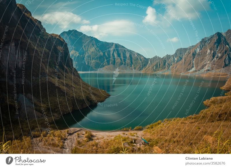 crater of mount pinatubo of the philippines Central perspective Day Deserted Exterior shot Multicoloured Colour photo Turquoise Volcanic crater Crater rim