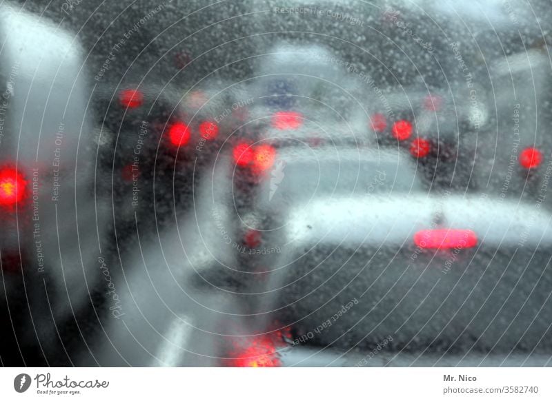 be stuck in traffic jam Rain Rear light Blur Transport Car Street Red Motoring Highway Means of transport Road traffic Traffic infrastructure Vehicle Rush hour