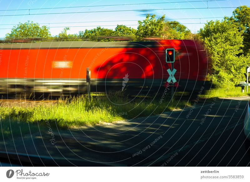 level crossing Track Railroad crossing passage einle. hektik Freight train logistics loc Engines swift speed Transport Provision railcar Train Haste Hectic