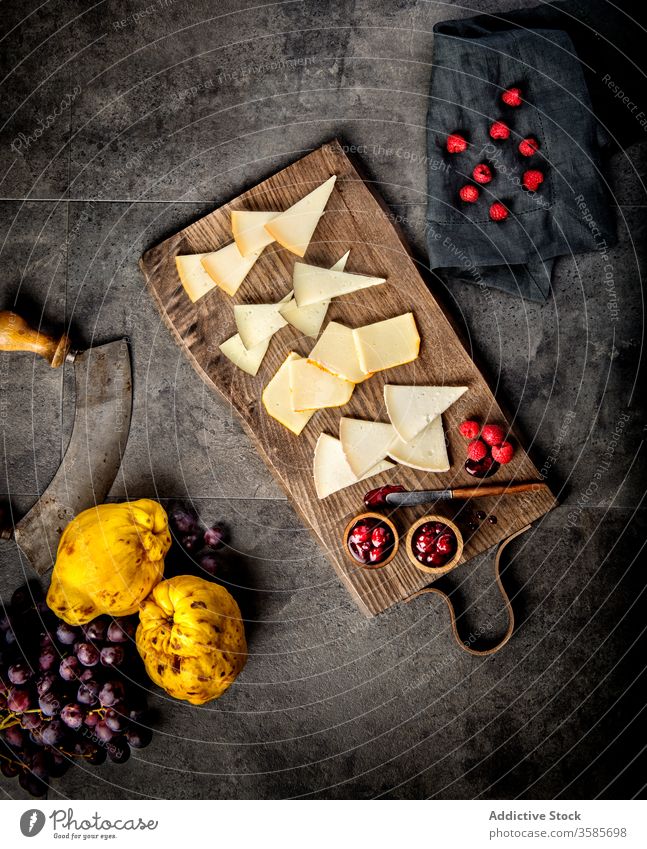 Cheese board with fresh berries and jam cheese berry fruit snack appetizer food natural tasty delicious set dessert slice nutrition serve gourmet arrangement