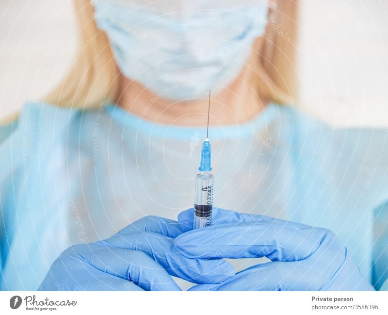 Nurse holds a syring,  Health care in hospital concept. Medicine vaccination. syringe doctor vaccine pandemic healthcare medicine coronavirus flu covid-19