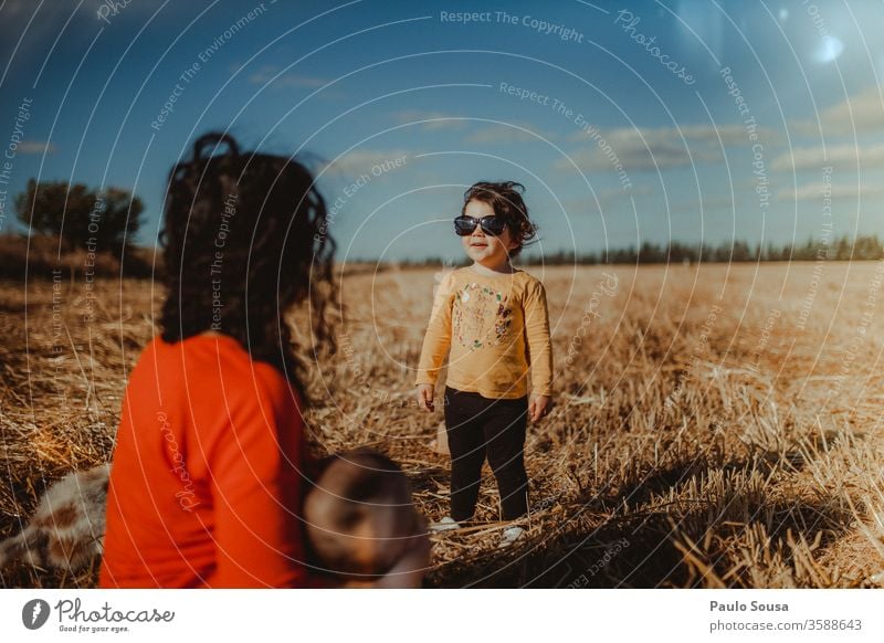 Child with sunglasses Sunglasses Summer Summer vacation Day Family & Relations Field Vacation & Travel Human being Nature Playing Boy (child) Colour photo