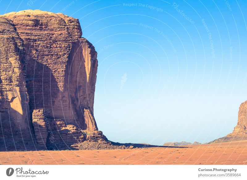 Red sand desert at sunny summer day in Wadi Rum, Jordan. Middle East. UNESCO World Heritage Site and is known as The Valley of the Moon. rum wadi jordan valley