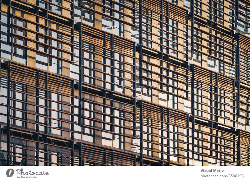 Geometric facade of a minimalist building under the last afternoon lights abstract abstract background abstract photography apartment architectonic