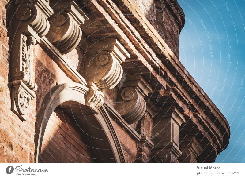 Neoclassical capital on the cornice of an old red brick building neoclassical facade ancient architecture ornamental authentic century heritage civilization