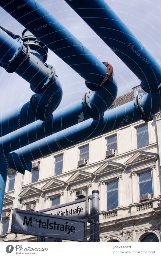 blue tubes across the Mittelstraße Facade Window Air conditioning Architecture Conduit Iron-pipe Symmetry Ravages of time conduit Construction Weathered