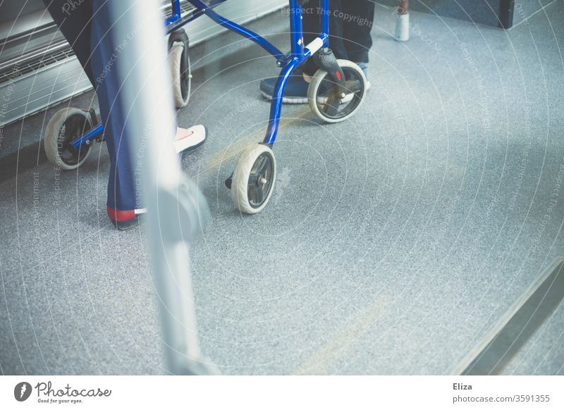 Person with walker in the bus Rollator handicap Mobility Senior citizen Handicapped Needy Bus Public transit public transportation mobile walking impediment