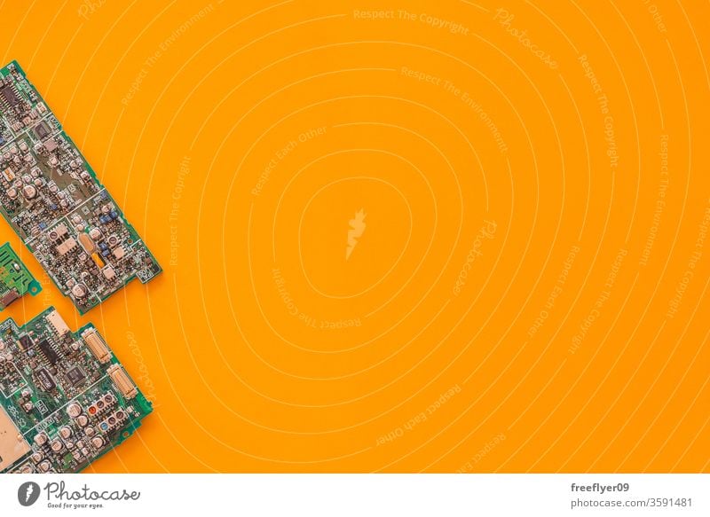 Flat lay of some motherboards against a yellow background technology processor recycling dismount computing flat lay flatlay copy space copyspace still