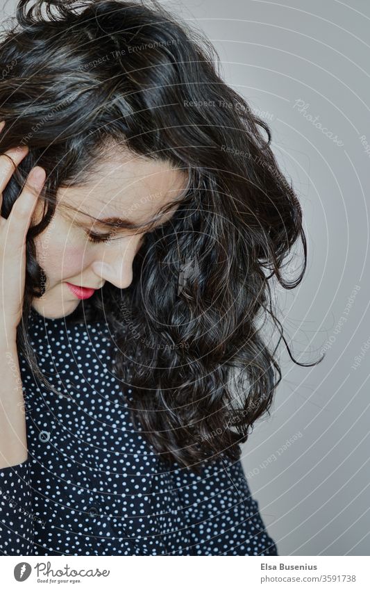 black-haired woman Woman Contrast Studio shot Colour photo Shame Emotions Black 30 - 45 years Adults Feminine Human being Young woman Fashion Black-haired