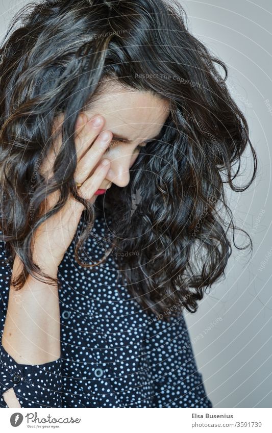 black-haired woman Woman Contrast Studio shot Colour photo Shame Emotions Black 30 - 45 years Adults Feminine Human being Young woman Fashion Black-haired