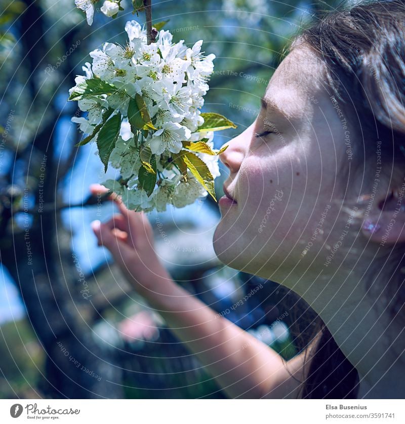 Spring girl judges cherry blossoms Child Human being Exterior shot Infancy 8 - 13 years Joy luck Colour photo Cherry blossom To enjoy enjoying Closed eyes