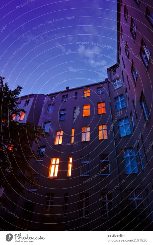 Backyard on an early summer evening Evening Old building on the outside Fire wall conceit arrogance Facade Window House (Residential Structure) Sky Sky blue