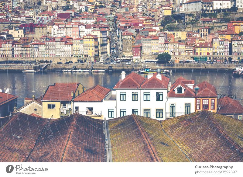 Douro river and Ribeira from roofs at Vila Nova de Gaia, Porto, Portugal. porto portugal view city old town douro architecture bridge travel historic portuguese