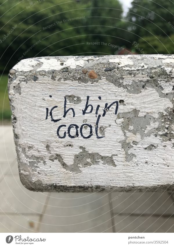 I'm cool. Confident statement full of self-love is written on a stone slab with a magic marker. Phrase, words. Youth Culture Self-Love Daub leap Write Cool