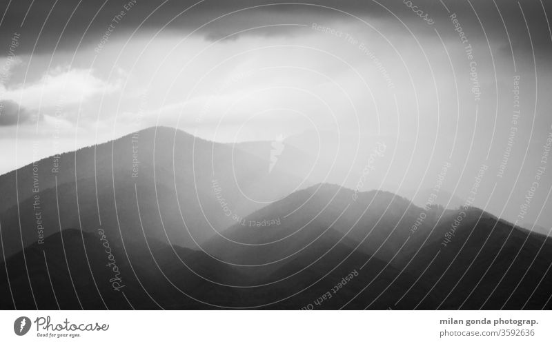 Storm over mountains of Turiec region, Slovakia. landscape rain storm Mala Fatra Carpathians nature forest black and white national park