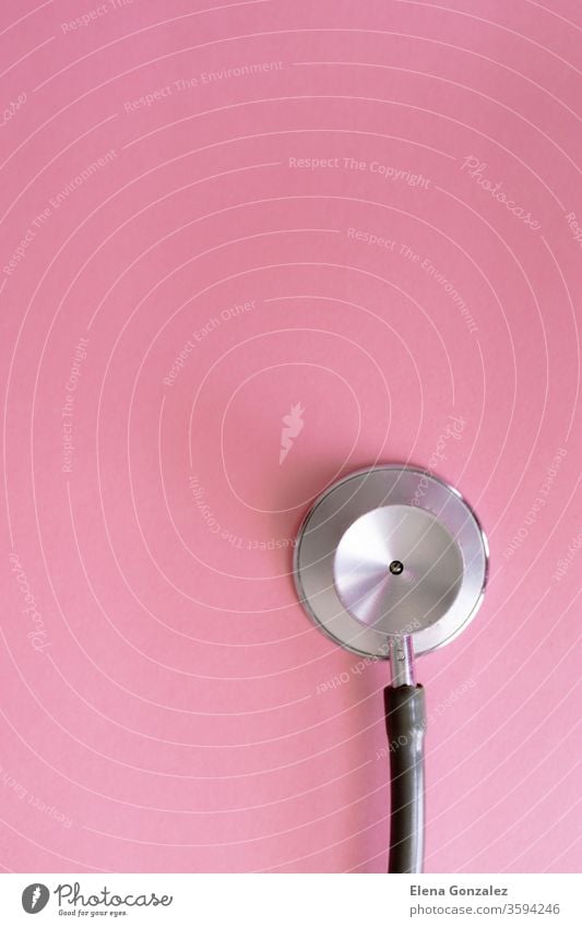 Top view of stethoscope on pink background for coronavirus prevention. Covid-19 kit. Copy Space. Medical concept. Flat lay medical covid covid-19 disease health