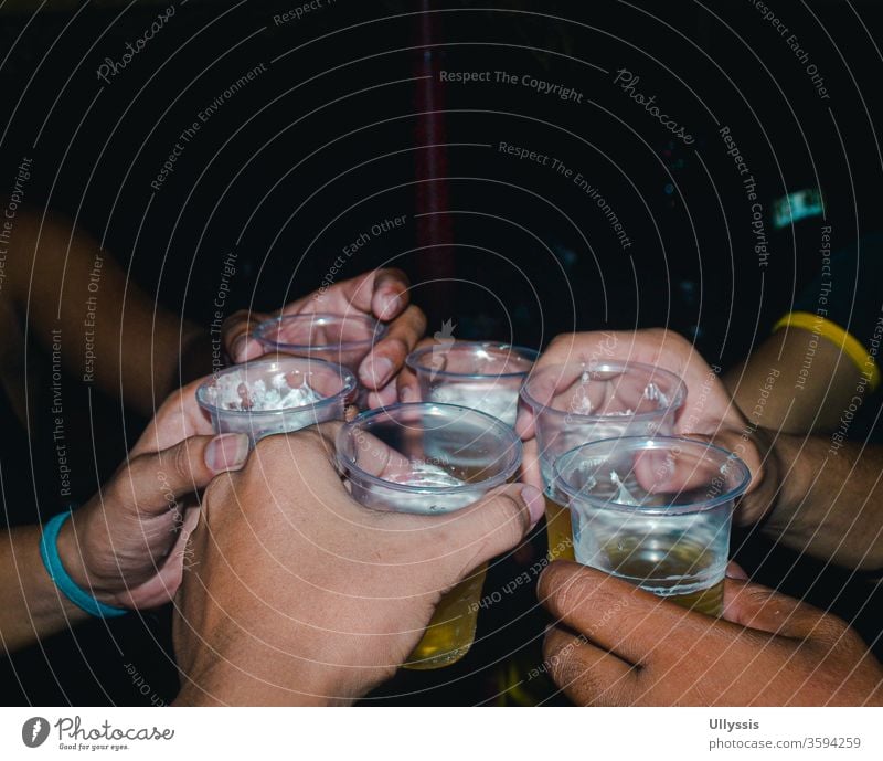 People making a toast of beers for a celebration alcohol bar beverage booze brewery celebrate celebrating celebrations champagne cheers cheers beer