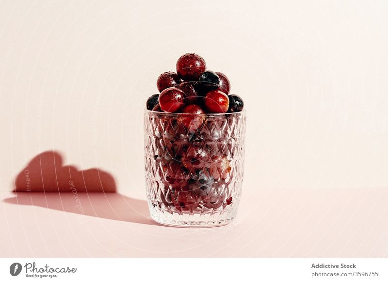 Fresh grapes in glass in studio fruit fresh ripe heap pile healthy food vitamin delicious tasty organic sweet natural nutrition diet ingredient vegetarian raw